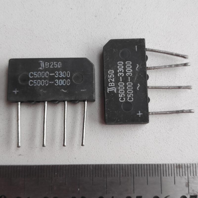 B250C5000A :    250V 5.0A -~~+
 
 : Diotec Semiconductor...